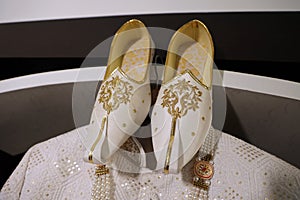 Indian groom wedding dress and footwear shoes photo background