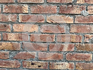 Indian Grunge brick wall texture for your background.Old red brick wall texture background in sunlight.Detailed old red brick wall