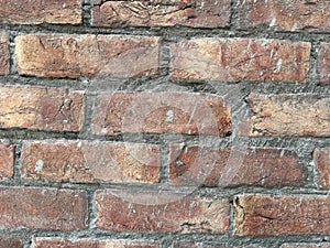 Indian Grunge brick wall texture for your background.Old red brick wall texture background in sunlight.Detailed old red brick wall