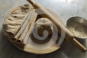 Indian handmade bread roti made of wheat and millet. photo