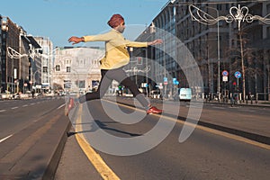 Indian handsome man jumping in an urban context