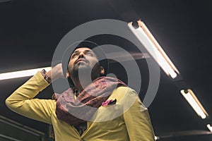 Indian handsome man posing in an urban context