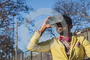 Indian handsome man wearing virtual reality headset