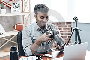 Indian Happy Young Man Photographer Work from Home