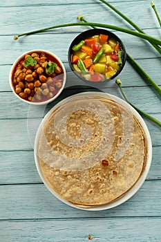 Indian healthy diet vegan foods- chapatti and curries