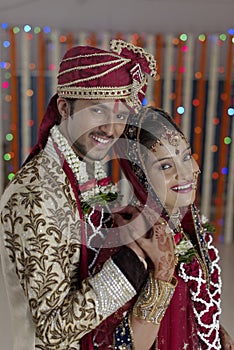 Indian Hindu Bride & Groom a happy smiling couple.