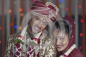 Indian Hindu Bride & Groom a happy smiling couple.