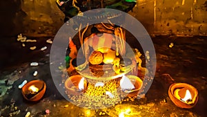 In The Indian Hindu Worship, At Night Time, Diya Lamp Burning Front Of Lord