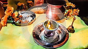 In The Indian Hindu Worship, At Night Time, Diya Lamp Burning Front Of Lord.