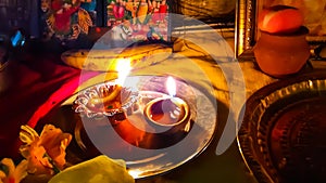 In The Indian Hindu Worship, At Night Time, Diya Lamp Burning Front Of Lord