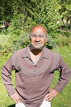 Indian hispanic man in green park photo