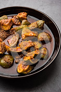 Indian Homemade Raw Mango Pickle or aam ka achar or Kairi Loncha in a bowl