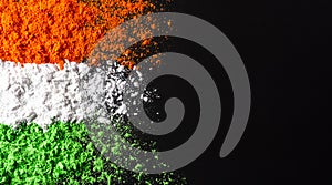 Indian Independence Day celebration background concept. Symbolic flag colors, red, green and orange powders colour splashed over