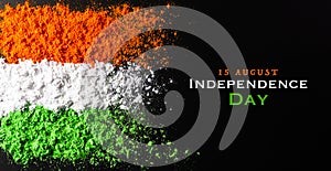 Indian Independence Day celebration background concept. Symbolic flag colors, red, green and orange powders colour splashed over