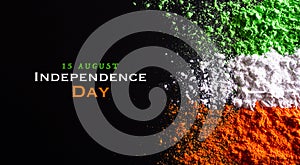 Indian Independence Day celebration background concept. Symbolic flag colors, red, green and orange powders colour splashed over