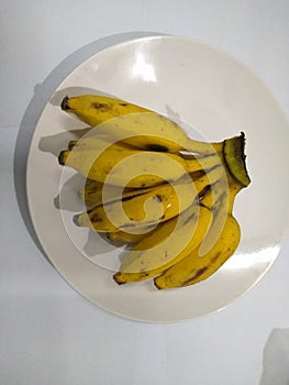 Indian kela in white plate.