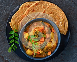 Indian Kerala meal-malabar parotha and stew
