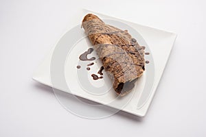 Indian Kids special Chocolate Dosa, served in a plate