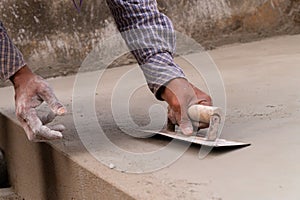 Indian labour plastering using trowel