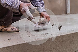 Indian labour plastering using trowel