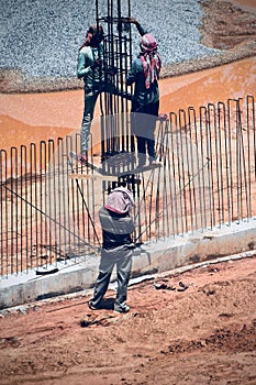 Indian labours are working in a construction site