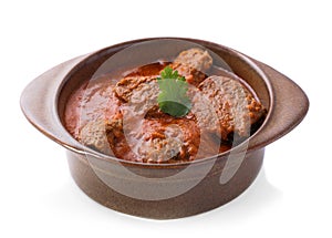 Indian lamb rogan josh served in pottery