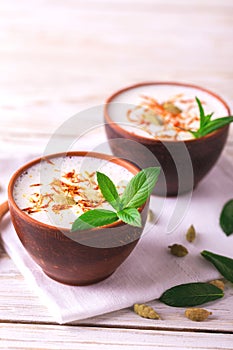 Indian lassi curd with cardamon, mint, vanilla and saffron