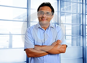 Indian latin businessman in office