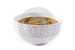 Indian lentil soup dal dhal in a bowl isolated