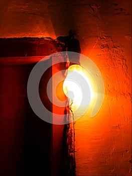 Indian lightning bulb hanging in front of the door