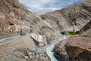 Indian lorry trucks on highway in Himalayas. Ladakh, India