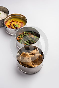 Indian Lunch box or tiffin - Spicy Ladies Finger, dal fry, rice and chapati