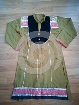 Indian made women`s traditional dress Kurta with embroidery design