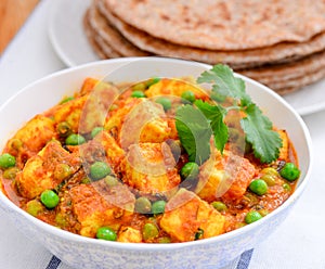 Indian main course-paratha and matar paneer photo