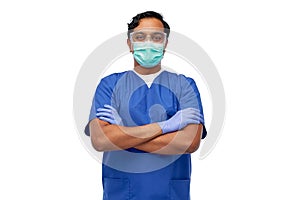 indian male doctor in blue uniform and mask