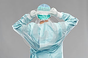 Indian male doctor or surgeon in protective wear photo