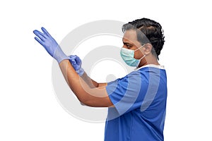 indian male doctor in uniform, mask and gloves