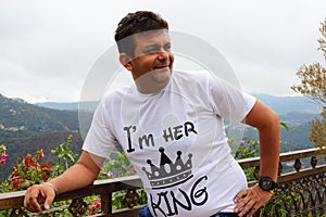 Indian man in Kasauli, Hill station, Looking at the valley enjoying morning view