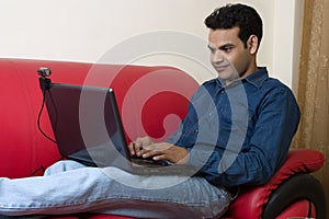 Indian man working from home