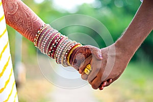 Indian Married Couple holding hands