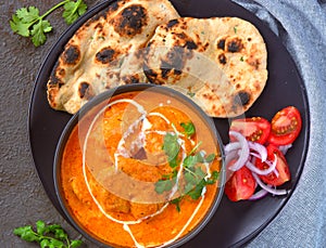 Indian Meal -Butter Chicken with roti and salad