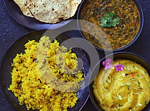 Indian meal served in blackbowls