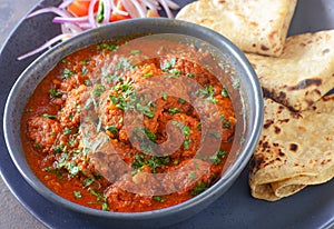 Indian meatballs kofta curry with roti flatbreads