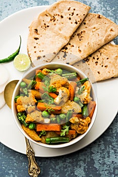 Indian Mix Veg or Mixed Vegetable recipe served in a bowl with chapati