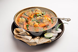 Indian Mix Veg or Mixed Vegetable recipe served in a bowl with chapati