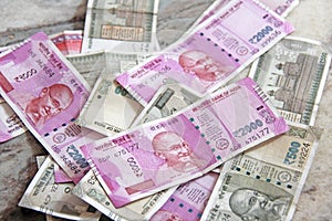 Indian money and banknotes, 500 rupees and 2,000 rupees. Background of paper Indian money