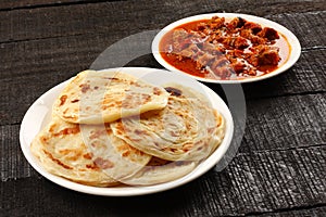 Indian mutton curry and paratha photo