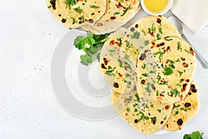 Indian naan bread over light background