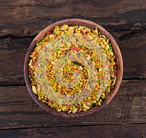 Indian Namkeen Food Navratan Mixture on Wooden Background