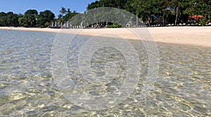 Indian Ocean tide at Nusa Dua beach in Bali Indonesia